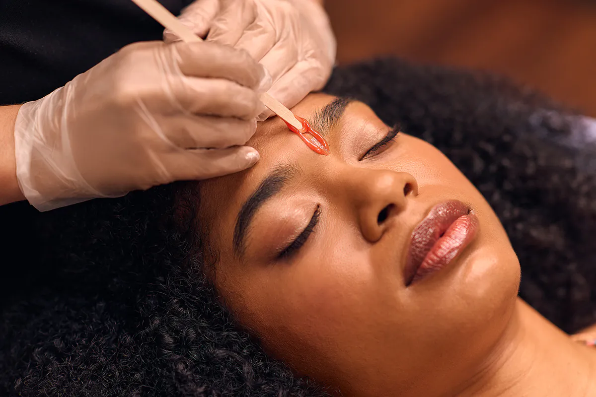 Eyebrow wax service at AA Nails & Spa